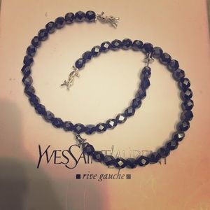 Never worn YSL large beaded hoop earrings.